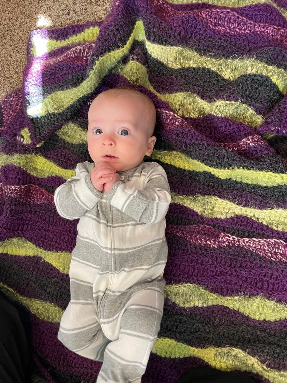 Birthday Baby on Crocheted Blanket